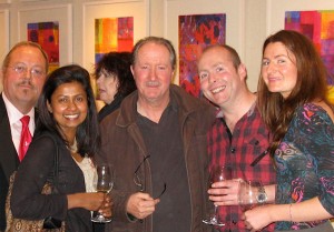 Liam de Frinse (left) and guests at the exhibition opening