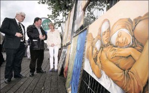 Art on The Liffey Boardwalk between the Ha’penny Bridge and O’Connell Bridge