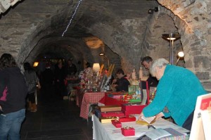 The market in the atmospheric 12th Century crypt of the Cathedral