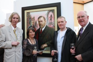 Curator Tony Strickland, artist Kate Bedell, artist Brian Gallagher and Aidan Doyle in front of a portrait of Bram Stoker by Aidan Hickey (photo Liam Madden)