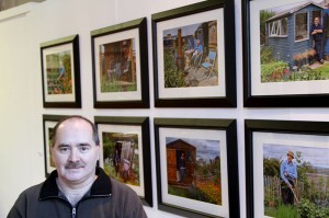 Stephen Gill with a selection of his images from the "Around the Allotments" exhibition