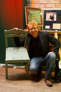 Tommy Fleming poses with his autographed chair.