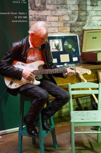 Shay Healy plays lot 124 - "The Rolling Stones: Autographed Fender Stratocaster Squier guitar"