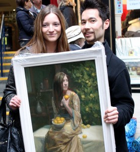 Artist Ray Tsang with Alyssa Rohan who modeled for this oil painting on canvas entitled "The Lemon Tree"