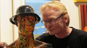 Frank O'Dea from Balla Ban Gallery with one of his works